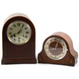 Two mantel clocks.