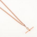 A 9 carat rose gold double albert watch chain.