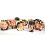 Eleven Royal Doulton character jugs,