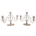Pair of Regency style silver plated three-light candelabra,