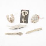 Six oversize vintage paste set dress clips and brooches.
