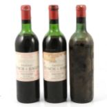 Eight assorted bottles and a half bottle of vintage French wines, low levels and seepage