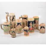 A collection of German pottery tankards,