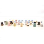 Twenty-seven ceramic thimbles, Wedgwood, Royal Crown Derby, Royal Worcester etc.