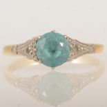 A heat treated blue zircon ring.