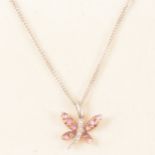 A pink sapphire and diamond butterfly pendant.