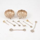 Pair of Indian white metal salts and collection of salt spoons.