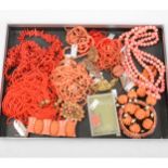 One tray of vintage natural coral and simulated coral bakelite jewellery.