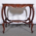 Edwardian walnut centre table, shaped serpentine top