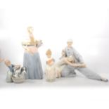 Four Lladro figurines.