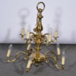 Dutch style brass two-tier ten light chandelier.