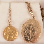 A 9 carat yellow gold oval locket and chain and a St Christopher and chain.