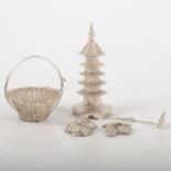 Chinese white metal miniature pagoda pepperette, and filigree salt basket and spoon.