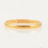 A 22 carat yellow gold wedding band,