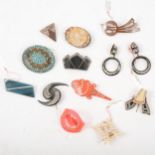 Twelve vintage celluloid and paste-set millinery flashes, brooches, and earrings.