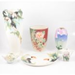 Franz porcelain Tucan vase, dish and four floral pieces.