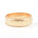 A 9 carat yellow gold Victorian style half hinged bangle.