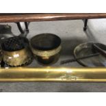 Brass fender, two fern pots, trivet, Dutch brass pan, auger