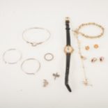A Gucci wrist watch, silver jewellery, broken 9 carat gold signet ring.