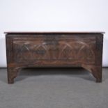 Boarded oak coffer, chip carved front fascia.