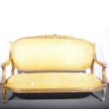 19th Century French giltwood canape, arched back with carved cresting