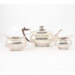 Silver three-piece teaset, Z Barraclough & Sons, Sheffield 1895 and 1896.