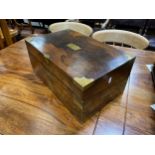 A large brass bound rosewood writing slope with fitted interior and key.