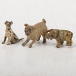 Two miniature cold painted models of dogs, and a miniature elephant