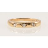 A 9 carat yellow gold ring set with cubic zirconia.