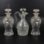 Pair of lead crystal decanters, jug and two flasks,