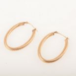 A pair of 9 carat gold hoop earrings.