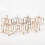 Silver toast rack and six silver plated toast racks,
