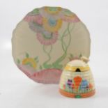 Clarice Cliff, a Crocus beehive preserve pot and cover, and an Aurea plate.