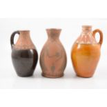 Three terracotta and sgraffito vessels by William and Gaye Fishley Holland