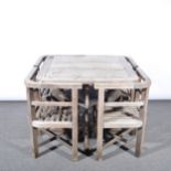 'Collingwood' teak garden table and four chairs, retailed by Heals