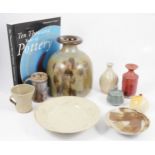 A collection of nine studio pottery items