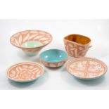 Five pieces of terracotta sgraffito ware by William and Gaye Fishley Holland.