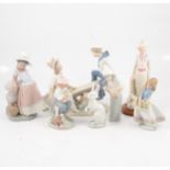 Six Lladro porcelain figures and a Spanish figure of an Edwardian lady