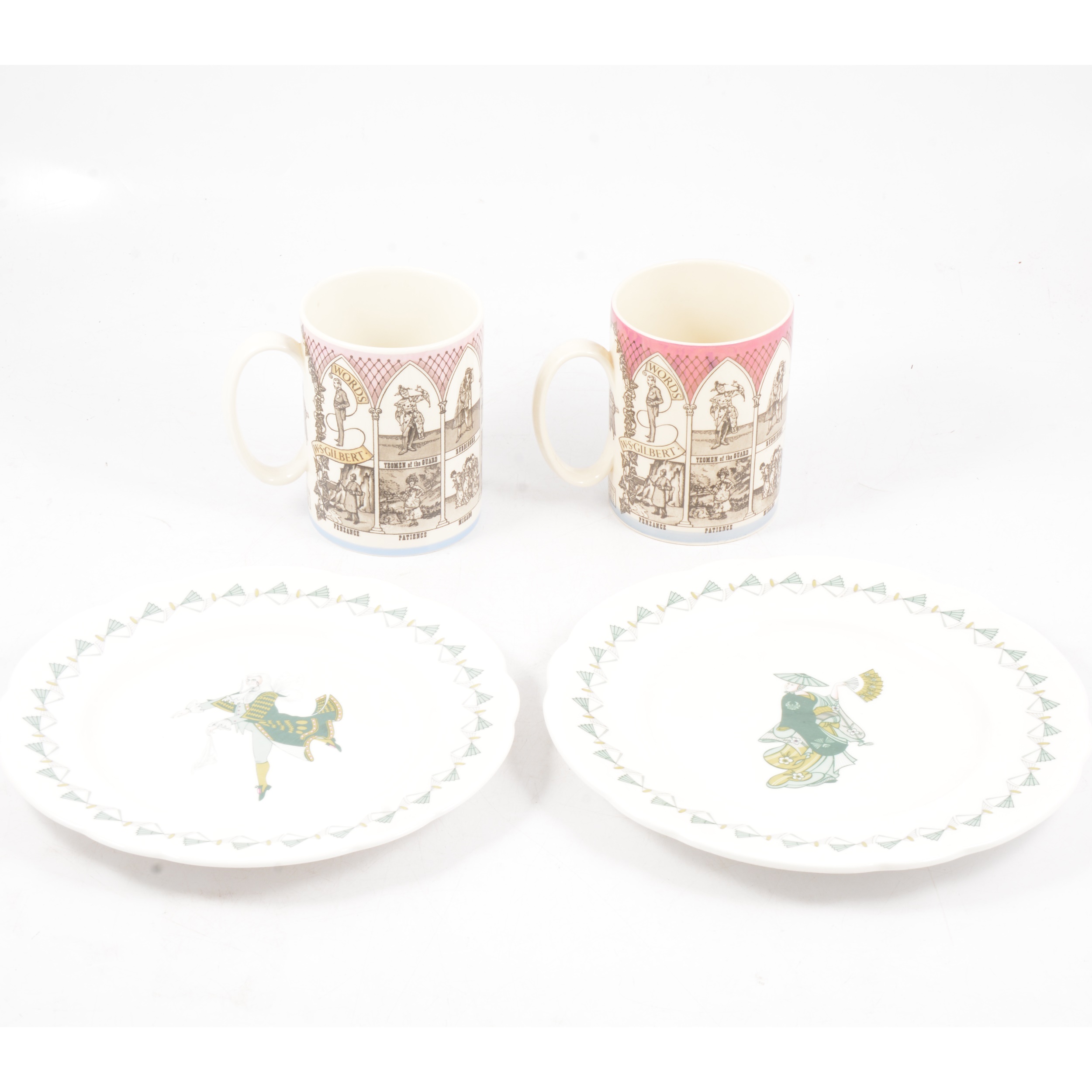 Two Wedgwood of Etruria Gilbert and Sullivan Operas Mugs, two Royal Worcester Mikado plates.