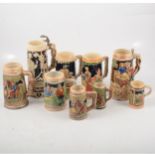 A collection of German pottery tankards,