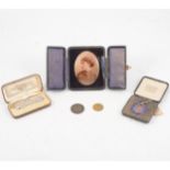 Photographic portrait miniature, duette paste set dress clip, tokens and silver enamelled medal.