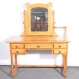 Contemporary oak dressing table and a stool.