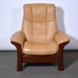 Stressless tan leather armchair.