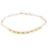 Natural yellow sapphire and diamond bracelet.