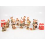 Collection of Hummel figures, two preserve pots by Goebel, etc.