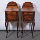 Pair of French walnut and rosewood bedside cabinets