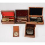 Two drawing sets, cased, and three compass',