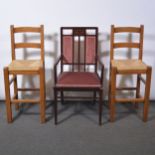 Edwardian elbow chair and a pair of modern kitchen bar chairs