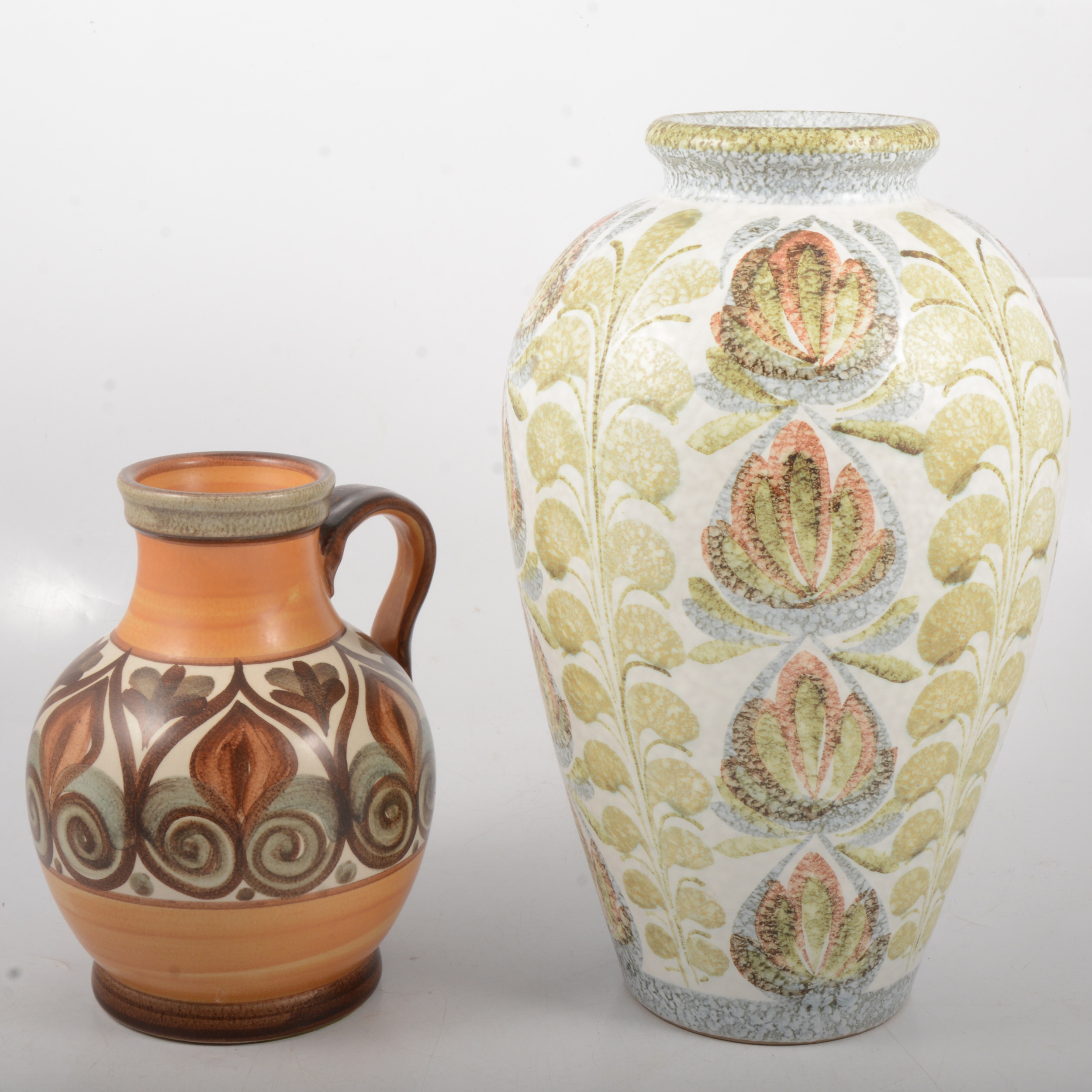 A Glyn Colledge design ovoid vase for Denby, green leaf pattern, and a pitcher.