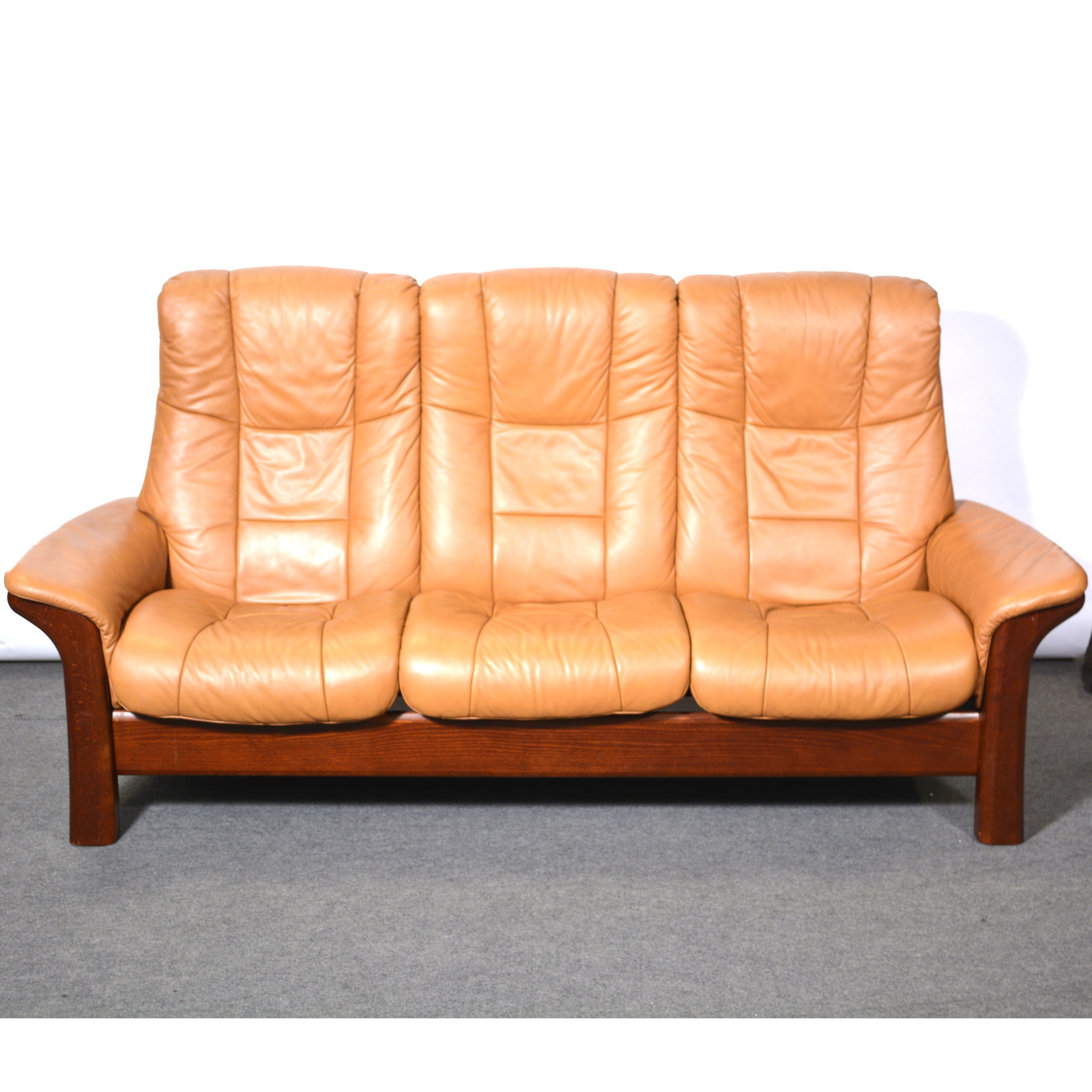 Stressless tan leather three seat sofa,